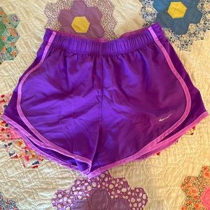 Purple Nike athletic shorts
